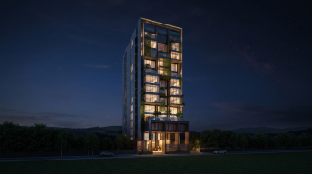 REVE residential development at night